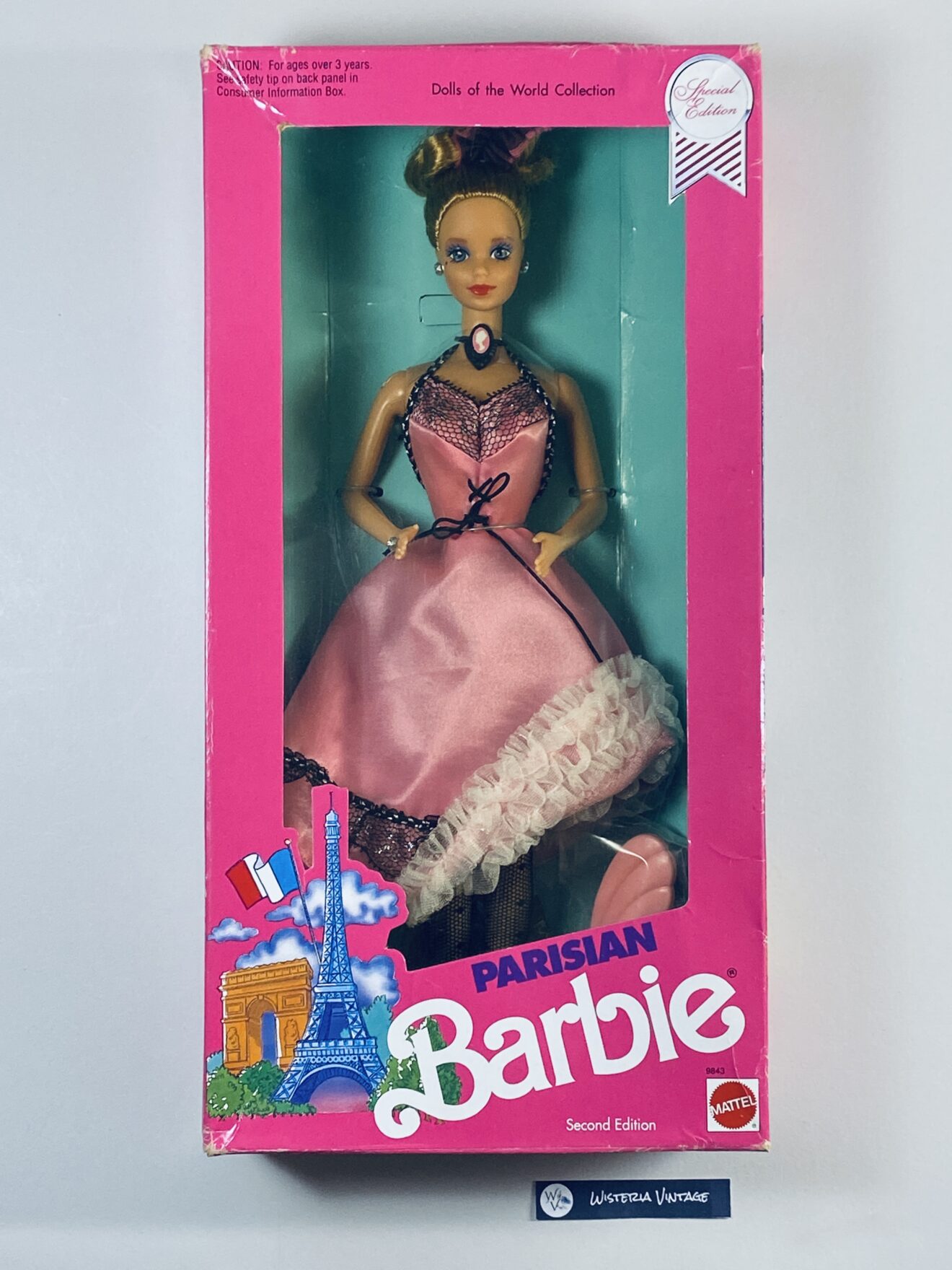 Barbie Parisian 1990 #9843 has never been removed from the box.